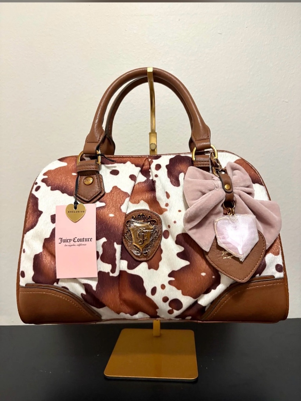 Juicy Couture Brown & White Cowhide Satchel with Pink Bow Charm